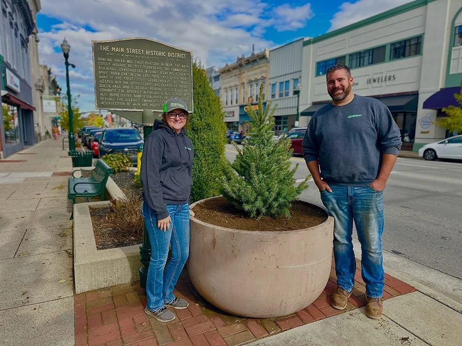 Two Crawford family team members standing outside