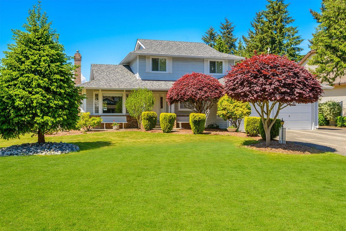 Home with landscaped front yard